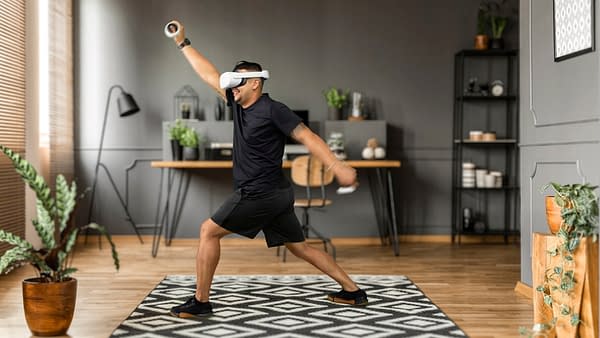 A promotional image of an Oculus user enjoying the interface of VZFit from his own home.