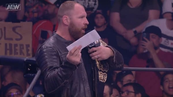 Jon Moxley drops a contract for the All Out main event AEW Championship match in the ring on AEW Dynamite
