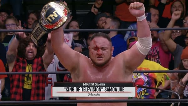 Samoa Joe celebrates winning the TNT Championship on AEW Dynamite