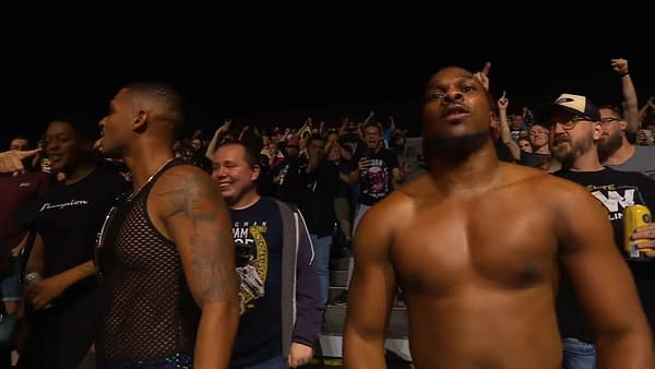 Private Party celebrates winning the AEW World Tag Team Championship in the crowd on AEW Dynamite