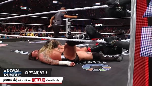 CM Punk wrestles Seth Rollins on the WWE Raw Netflix debut in a ring plastered with the logo for Saudi Arabia's Riyadh Season sports and entertainment program.