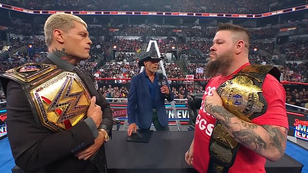 Shawn Michaels moderates a contract signing between Cody Rhodes and Kevin Owens on WWE Saturday Night's Main Event