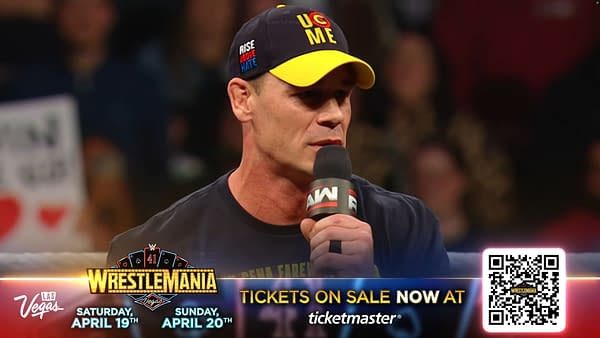 John Cena performing a promo during WWE Raw in Scotland, wearing a cap with the slogan 'U Can't See Me' and holding a microphone, while fans can be seen in the background.