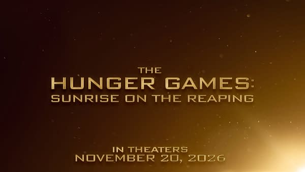 A digital promotional banner for 'The Hunger Games: Sunrise on the Reaping', featuring golden text on a dark gradient background, announcing the film's release date of November 20, 2026.