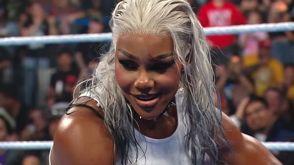 Jade Cargill, in a sleeveless top and sporting long, silver hair, displays a confident expression in a wrestling ring during WWE SmackDown. The crowd is visible in the background, indicating an energetic atmosphere.