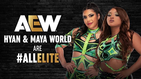 Illustration showcasing Hyan and Maya World, two female wrestlers in vibrant, green outfits adorned with sequins, confidently posing against a dark brick background with the AEW logo prominently featured.