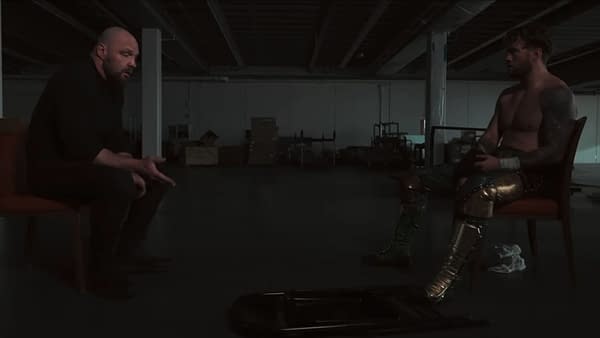 Jon Moxley speaks to a captive Will Ospreay in a dark backstage setting on AEW Collision.