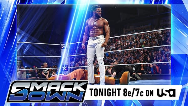 A WWE SmackDown wrestler stands over an opponent lying on the mat inside the ring, with bright blue arena lights and a packed crowd behind him. The SmackDown logo and