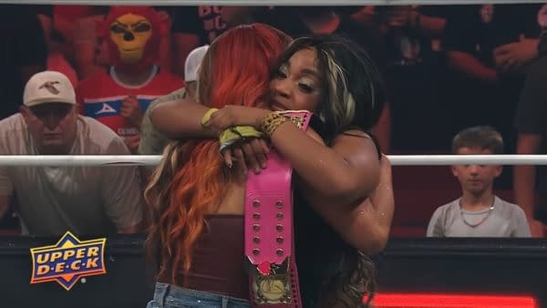Mercedes Moné hugs Maya World in the AEW ring after World's upset victory, with the Owen Hart tournament finals ahead.