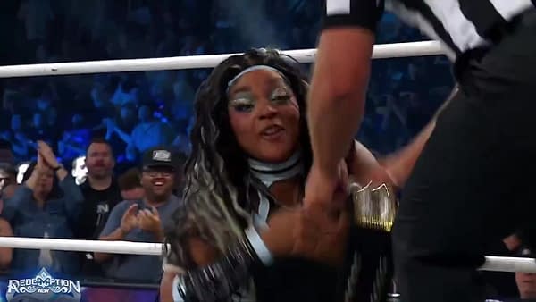 Maya World celebrates winning the TBS Championship at AEW Redemption