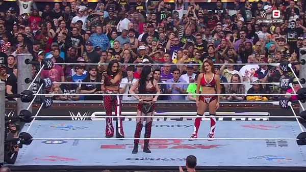 The Bellas prepare to stab Paige in the back like she stabbed WWE in the back when she wrestled for AEW