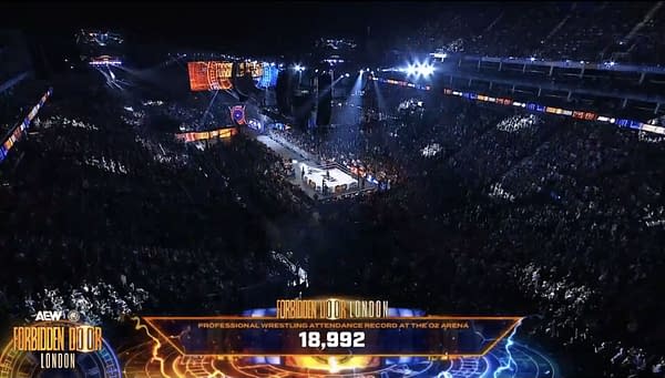 An aerial view of a packed O2 Arena during the AEW x NJPW Forbidden Door event, with bright lights shining down on the wrestling ring. The attendance record of 18,992 is displayed prominently at the bottom of the image.