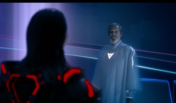 Illustration from Disney's 'TRON: ARES,' featuring Jared Leto as Ares facing Jeff Bridges as Flynn, with a futuristic background showcasing glowing lines and a digital aesthetic.
