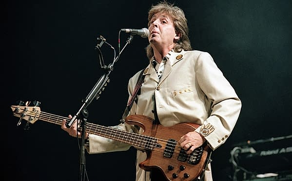 Washington DC. USA, 4th July, 1990 Paul McCartney performs at the Fourth of July concert in the Robert F. Kennedy football stadium. (Image: mark reinstein/Shutterstock.com)