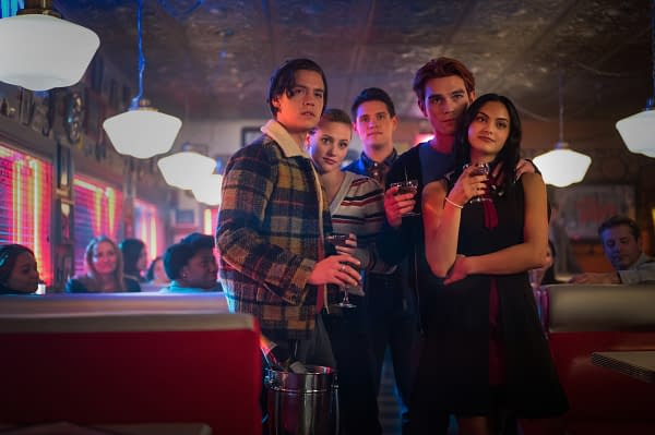 Cole Sprouse as Jughead Jones, Lili Reinhart as Betty Cooper, Casey Cott as Kevin Keller, KJ Apa as Archie Andrews, and Camila Mendes as Veronica Lodge in Riverdale, courtesy of The CW.