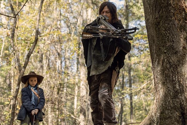 Norman Reedus as Daryl Dixon, Cailey Fleming as Judith Grimes in The Walking Dead, courtesy of AMC Networks.