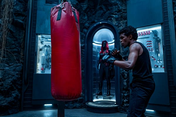 Camrus Johnson as Luke Fox working the bag on Batwoman, courtesy of The CW.