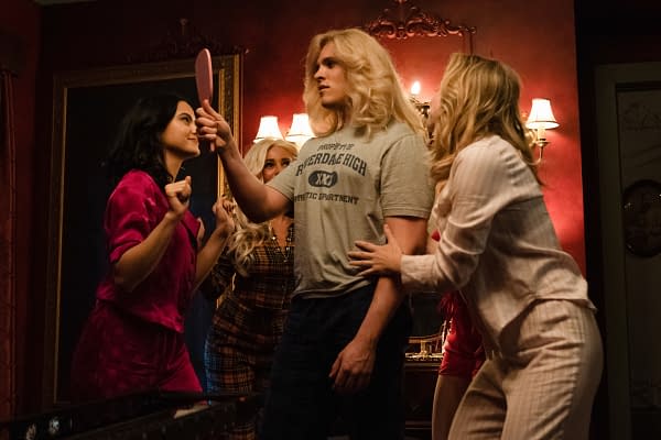 Veronica, Toni, and Betty convince Kevin to perform on stage in Riverdale, courtesy of The CW.