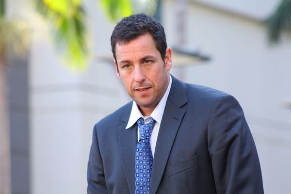Comedian Adam Sandler on stage at his Walk of Fame ceremony on February 1, 2011 in Hollywood, CA 2011. Editorial credit: RoidRanger / Shutterstock.com