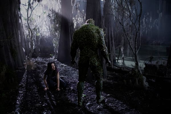 Swamp Thing -- "Darkness on the Edge of Town" -- Image Number: SWP104a_0217r -- Pictured (L -R): Crystal Reed as Dr. Abby Arcane and Derek Mears as Swamp Thing -- Photo: Fred Norris / 2020 Warner Bros. Entertainment Inc. -- © 2020 Warner Bros. Entertainment Inc. All Rights Reserved.