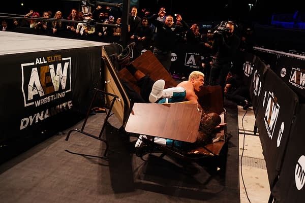 Cody Rhodes crashes through a table with Shaq on AEW Dynamite - Credit: All Elite Wrestling
