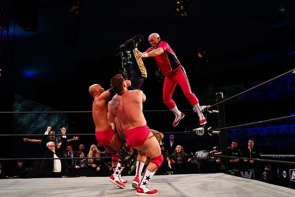 Tully Blanchard joins FTR in a trios match against Jurassic Express on AEW Dynamite - Credit: All Elite Wrestling