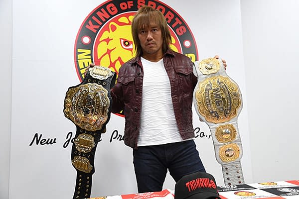 Naito holding both the IWGP Heavyweight and Intercontinental belts, courtesy of NJPW.