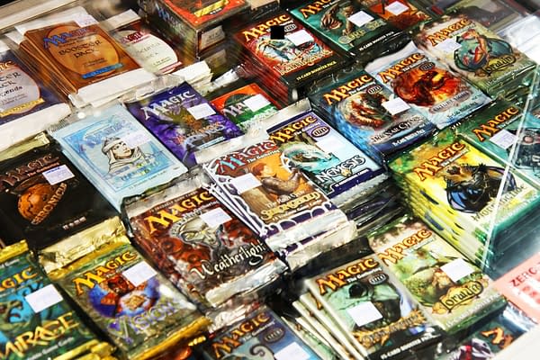 A large pile of sorted, albeit unopened, packs of Magic: The Gathering cards. Source: MIT