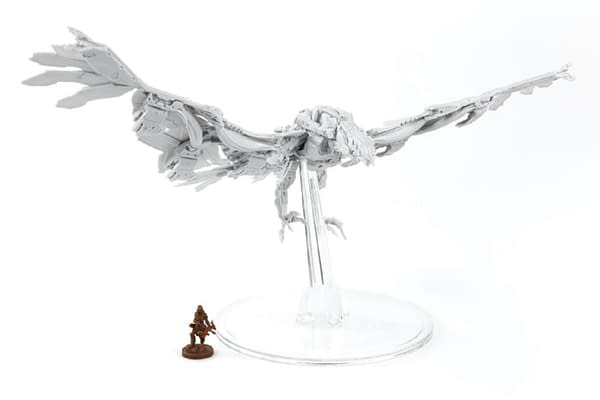 A better look at the render for the Stormbird in its namesake expansion for Horizon: Zero Dawn: The Board Game, by Steamforged Games, with a human figure for scale.