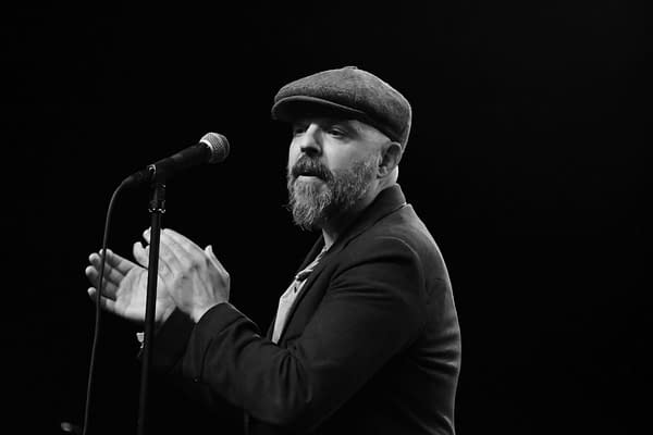 Indie artist Shayfer James clapping to establish a rhythm for one of his songs. Photo taken at the Rapids Theater in Niagara, NY on August 17th,. Photo credit: Brittney Bender