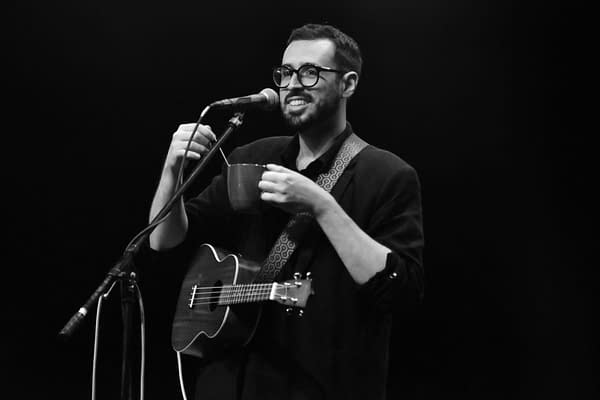 Avant-pop musical artist Will Wood enjoying a cup of tea during the August 17th Niagara, NY leg of his In case I make it, tour at the Rapids Theater. Photo credit: Brittney Bender