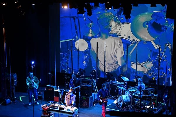 They Might Be Giants, showcasing their drummer Marty Beller during their performance of "Marty Beller Mask" in the first set. Photo credit: Britt Bender