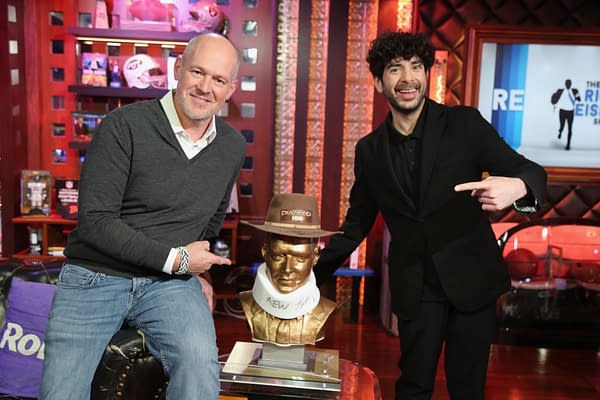 Rich Eisen and Tony Khan pose with Tony Khan's iconic neck brace on The Rich Eisen Show (Photo: The Rich Eisen Show)