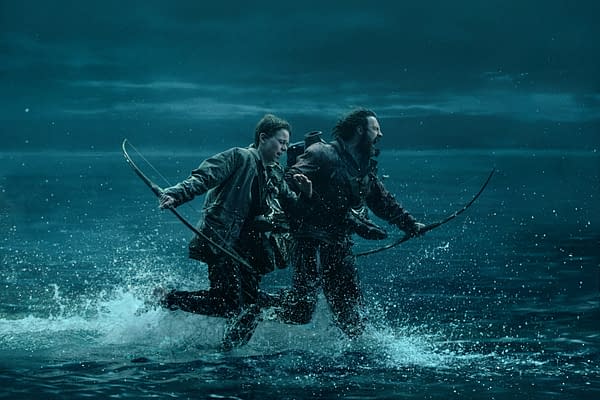 A dramatic scene depicting two figures running through water, wielding bows, with expressions of urgency and determination. The background is dark and moody, enhancing the sense of action and danger.