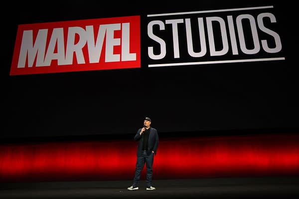 Kevin Feige, President of Marvel Studios, speaks on stage against a backdrop displaying the Marvel Studios logo during the Walt Disney Studios presentation at CinemaCon 2024 in Las Vegas.