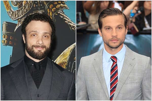 A split image featuring two actors: on the left, a man with a beard and curly hair, dressed in a dark suit, and on the right, a clean-shaven man in a light gray checked suit with a striped tie. This image relates to 'The Odyssey.'