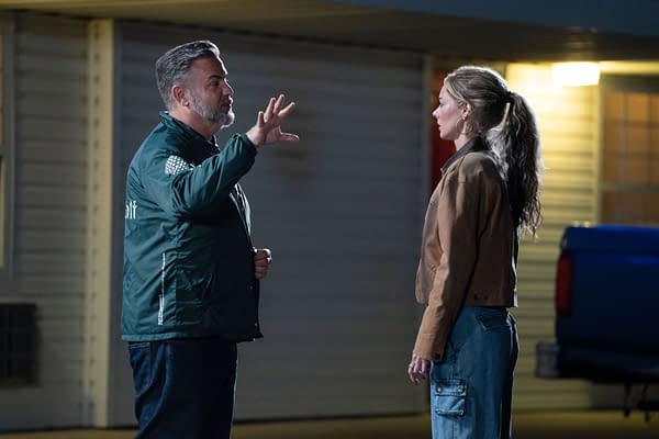 Director Shawn Simmons gestures animatedly while discussing a scene with actress Samara Weaving on the set of 'EENIE MEANIE'.