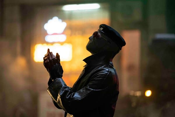 The Running Man poster features a character wearing a black leather coat and gloves, looking upwards with a masked face and sunglasses, set against a softly glowing background.