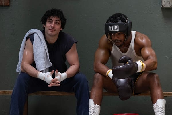 Anthony Ippolito and Stephen James sit on a gym bench in boxing gear on the set of I Play Rocky (2026).