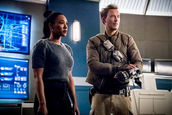 Candice Patton as Iris West - Allen and Tom Cavanagh as Nash Wells in The Flash, courtesy of The CW.