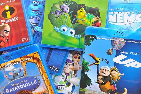 A collection of films by Disney Pixar Animation Studios on Blu-ray, including Finding Nemo, Up, Wall-e, Toy Story, Monsters and Ratatouille. Editorial credit: Christian Bertrand / Shutterstock.com