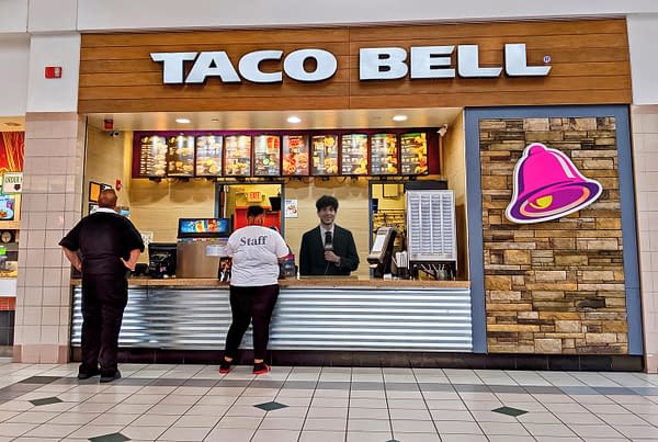 Artist representation of Tony Khan invading Taco Bell after AEW Rampage to slip medium sauces in The Chadster's bag. Based on original photo, credit: QualityHD / Shutterstock.com