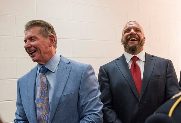 WWE CEO Vince McMahon and Paul "Triple H" Levesque speak to Army Command Sgt. Maj. John W. Troxell, Senior Enlisted Advisor to the Chairman of the Joint Chiefs of Staff, before the 14th Annual Tribute to the Troops Event at the Verizon Center in Washington, D.C., Dec. 13, 2016. WWE Tribute to the Troops is an annual event held by WWE and Armed Forces Entertainment in December during the holiday season since 2003, to honor and entertain United States Armed Forces members. WWE performers and employees travel to military camps, bases and hospitals, including the Walter Reed Army Medical Center and Bethesda Naval Hospital. DoD Photo by Navy Petty Officer 2nd Class Dominique A. Pineiro