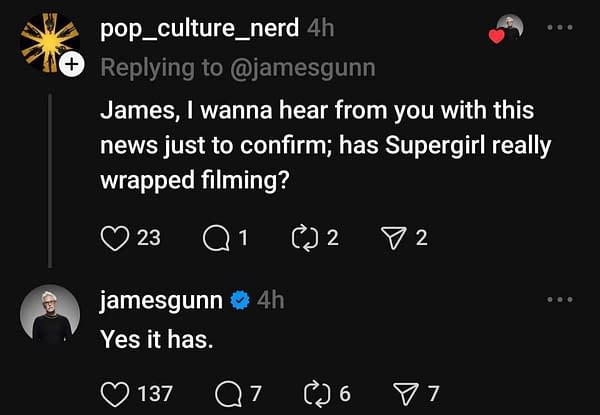 A screenshot from a social media post discussing the completion of filming for 'Supergirl: Woman of Tomorrow.' The post includes a question from a user and a verified response from James Gunn confirming the news.