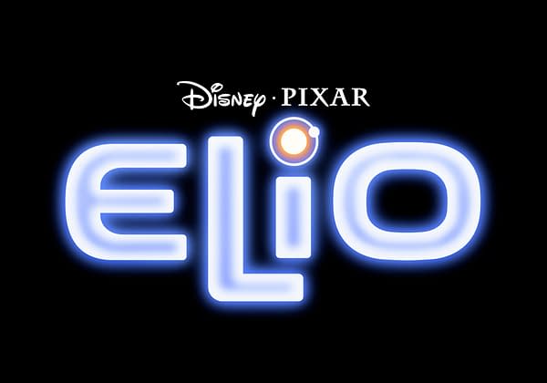 The logo for 'Elio,' a Disney Pixar production, features the title in glowing blue letters with an orange circle placed above the 'i,' set against a black background.