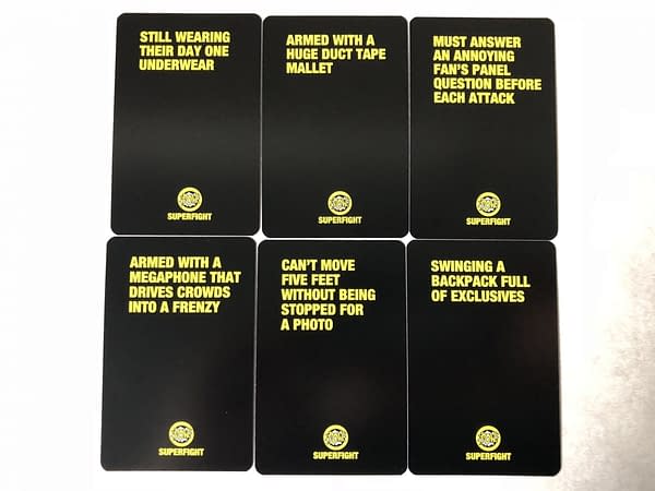 Playing With Con-Fidence: We Review Superfight &#038; Red Flags' Con Decks