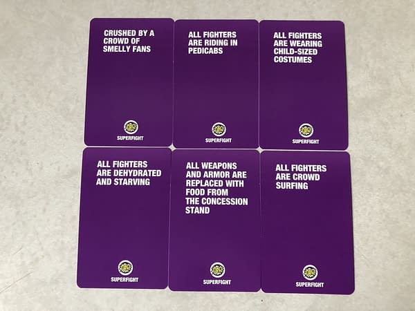 Playing With Con-Fidence: We Review Superfight &#038; Red Flags' Con Decks