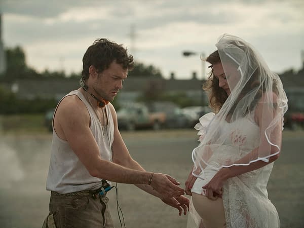 BRAVE NEW WORLD -- "Pilot" Episode 101 -- Pictured: (l-r) Alden Ehrenreich as John the Savage, Lara Peake as Madysun -- (Photo by: Steve Schofield/Peacock)