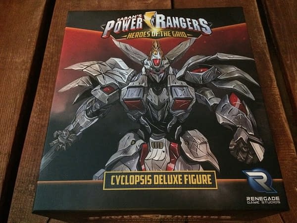 The front lid of the box for the Cyclopsis deluxe figure from Renegade Game Studios' Power Rangers: Heroes of the Grid board game.