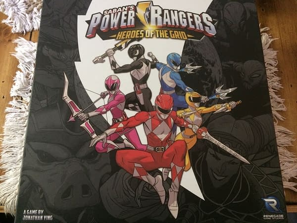 The front lid for the Power Rangers: Heroes of the Grid board game's core game by Renegade Game Studios.